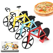 Set of four colorful double wheel bicycle pizza cutters in cream yellow light blue and red plastic with black wheels