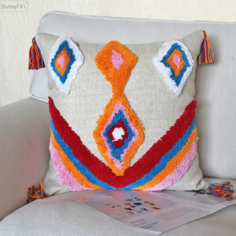 Beige boho tassel macrame pillow covers with vibrant geometric patterns and colorful tassels for decorbites boho tassel decor