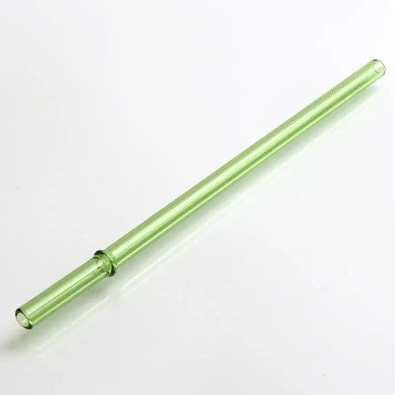 A decorbites glass bent straw in translucent light green with a smooth cylindrical shape for reusable kitchen use