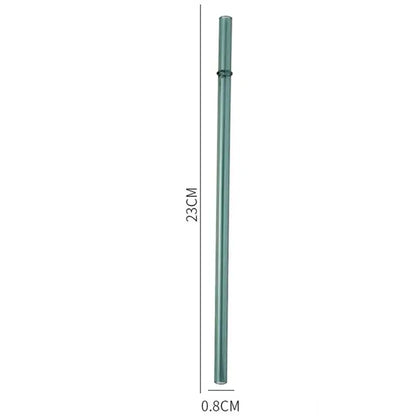 A sleek translucent teal decorbites glass bent straw with a smooth cylindrical design and a metallic ring near the top