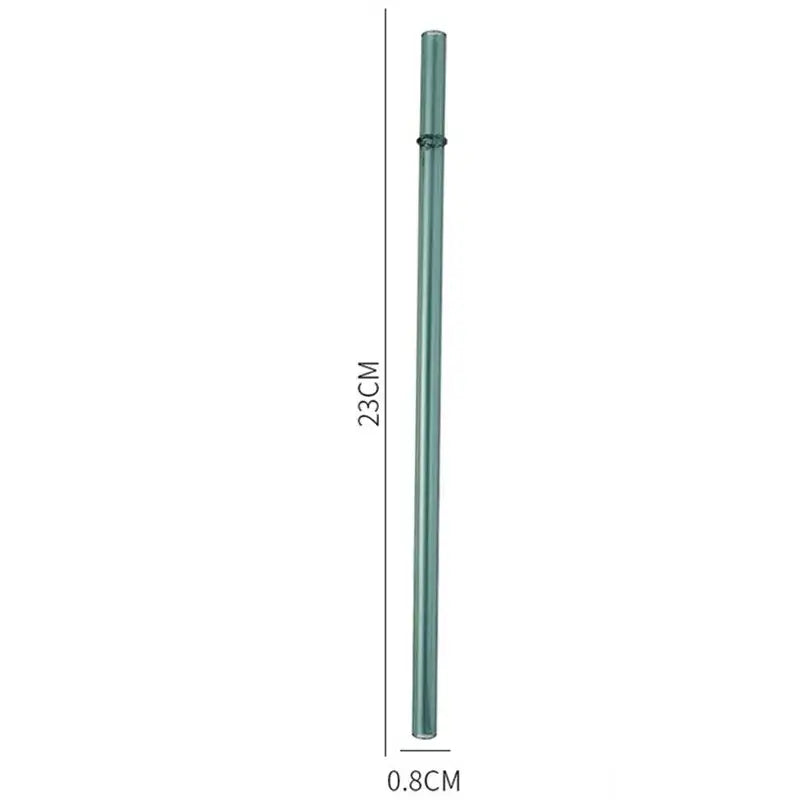 A sleek translucent teal decorbites glass bent straw with a smooth cylindrical design and a metallic ring near the top