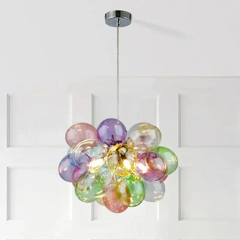 A modern decorbites glass bubble chandelier pendant light with translucent pastel glass spheres for living room decor