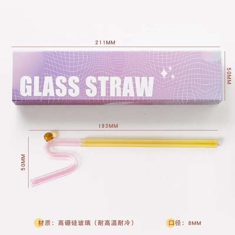 Translucent yellow and pink glass flower handle stir bar with gold bulbous tip made of high purity silica glass