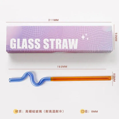 A colorful glass flower handle stir bar with a blue wavy section and orange straight end for kitchen cocktails