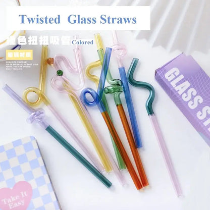 Colorful glass flower handle stir bar and twisted glass cocktail straws in yellow blue green and pink hues