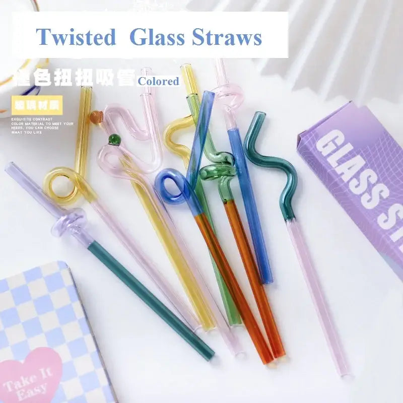 Colorful glass flower handle stir bar and twisted glass cocktail straws in yellow blue green and pink hues