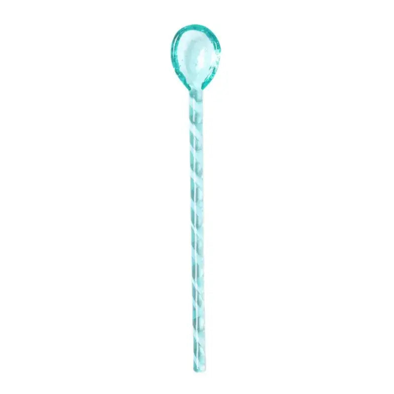 Translucent turquoise colorful glass stirring spoon with twisted spiral handle from decorbites colorful glass set for kitchen