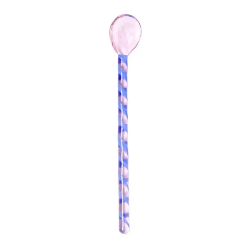 A translucent pink colorful glass stirring spoon with a blue and white twisted pattern for decorbites colorful glass set