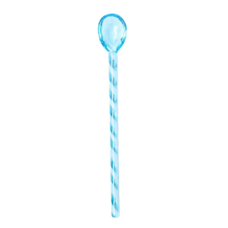 A translucent light blue colorful glass stirring spoon with a twisted handle from decorbites colorful glass set