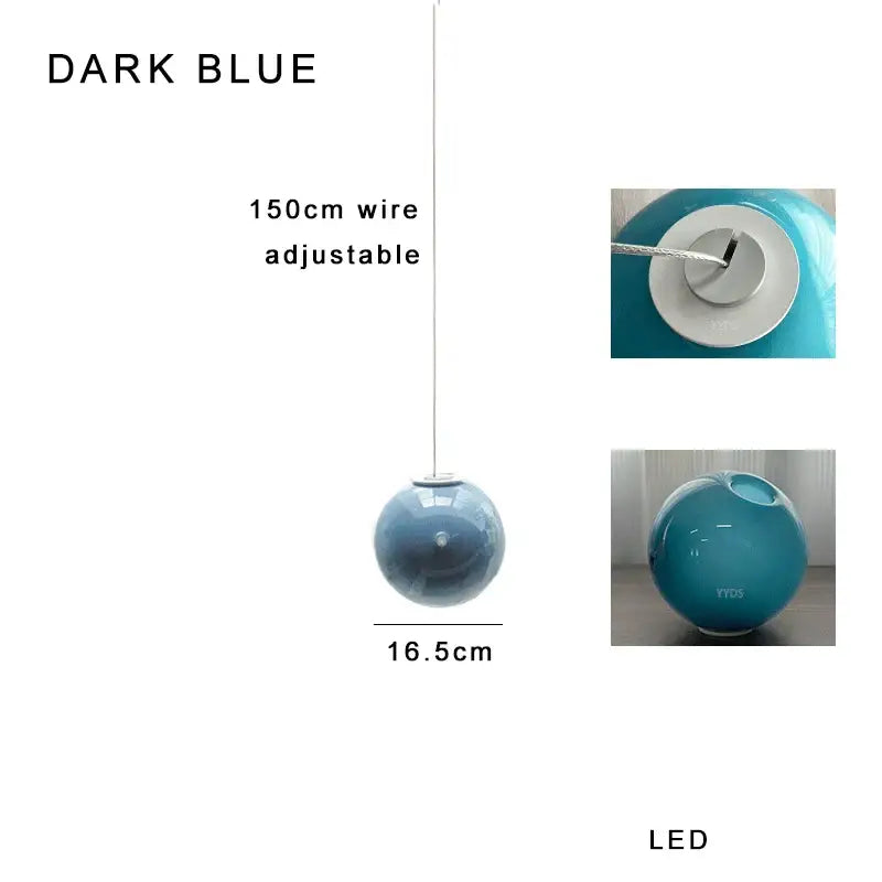 Dark blue spherical pendant light with 150cm adjustable wire and glossy finish from decorbites colorful glaze glass collection
