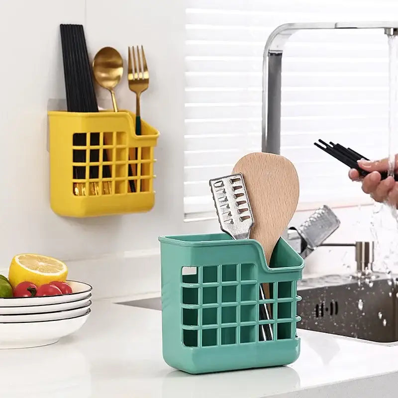 Teal plastic kitchen cutlery storage holder with colorful grid pattern and integrated handle for decorbites kitchen cutlery organization