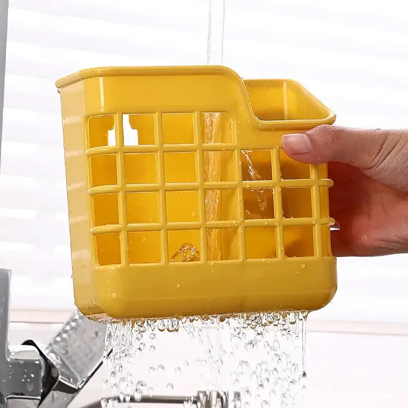 Bright yellow plastic decorbites kitchen cutlery storage holder with grid pattern and integrated handle for utensils