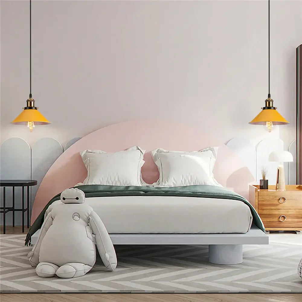 Soft pink curved headboard with minimalist design and matte finish paired with decorbites colorful industrial loft pendant light
