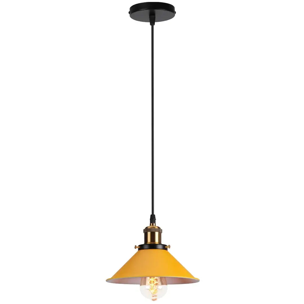 Yellow bell-shaped pendant light with black ceiling mount and brass accents for decorbites colorful industrial loft design