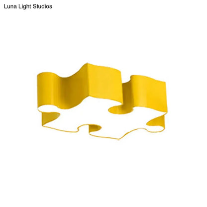 A sleek red yellow decorbites kids style jigsaw puzzles ceiling flush light with acrylic led flushmount and metallic finish