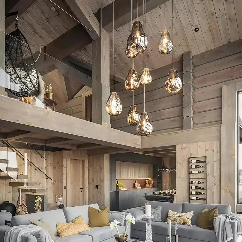 A colorful modern glass chandelier with teardrop amber pendant lights for dining room decorbites colorful modern design