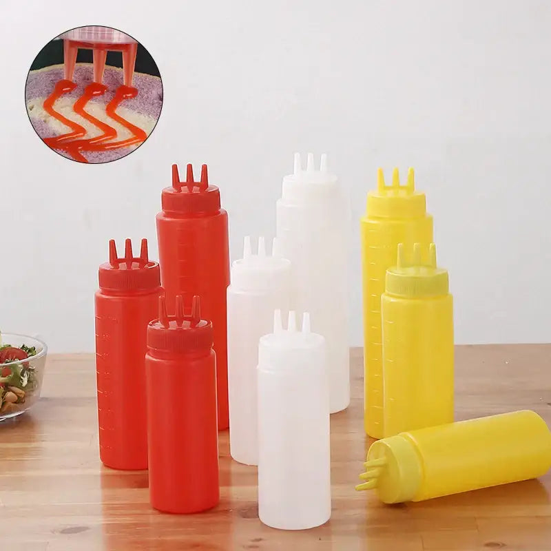 Colorful plastic decorbites condiment squeeze bottle set with multi-pronged nozzles for kitchen sauce dispensing