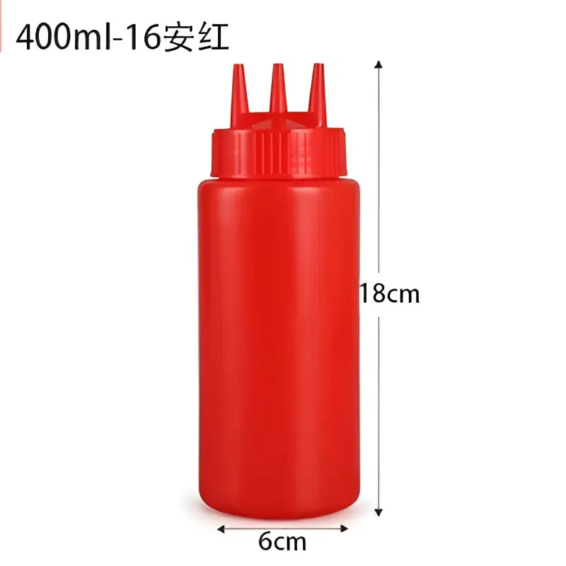 Red plastic decorbites condiment squeeze bottle with three spouts 400ml for kitchen use in a colorful squeeze bottle set