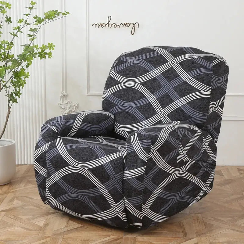 Black recliner chair with colorful patchwork elastic sofa cover featuring white and gray geometric pattern for living room protection