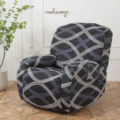 Black recliner chair with colorful patchwork elastic sofa cover featuring white and gray geometric pattern for living room protection