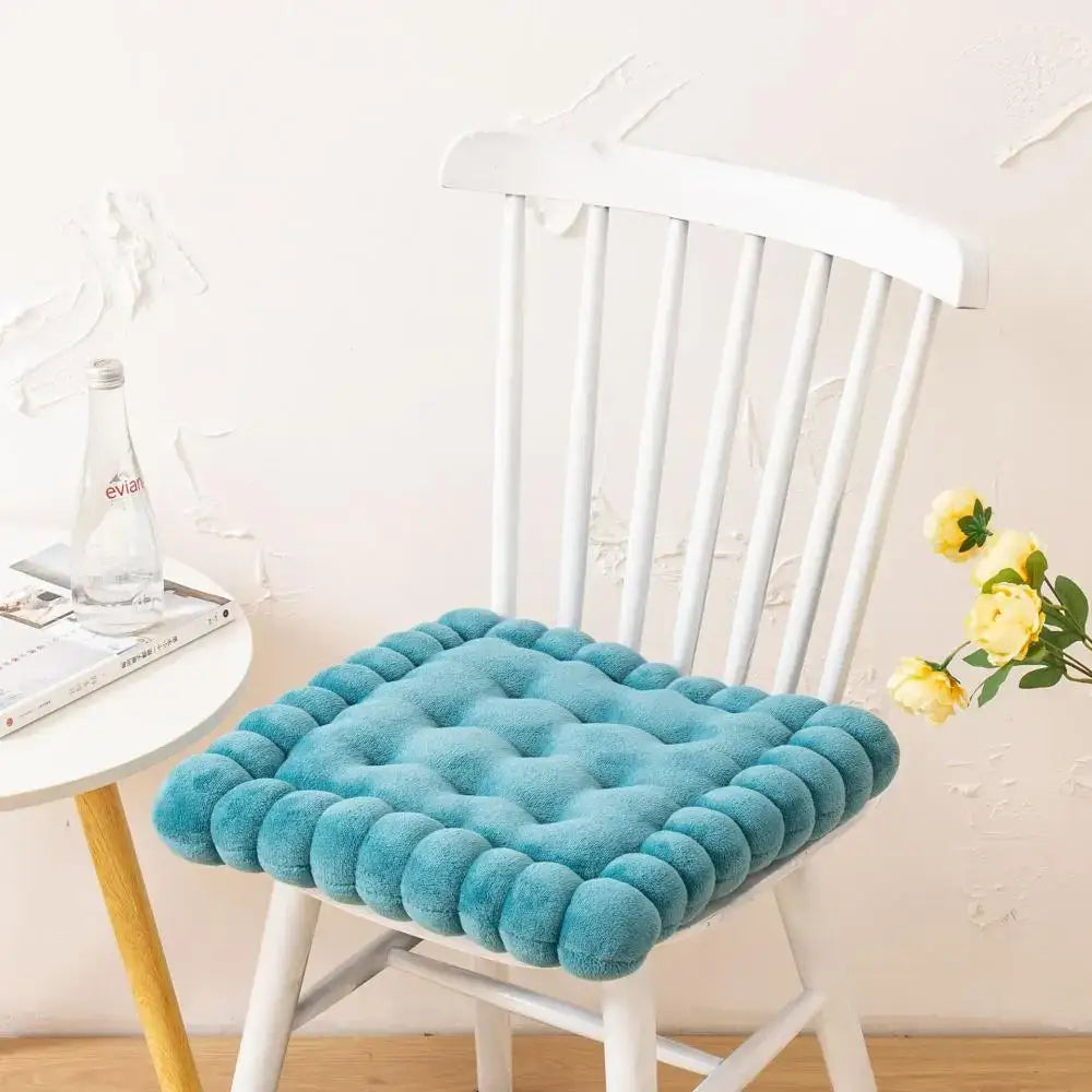 Teal quilted cookie biscuit cushion with plush rounded texture and soft fabric for living room decor square pillow