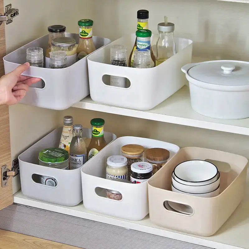 White plastic decorbites kitchenware storage containers with integrated handles organizing dishes on shelves