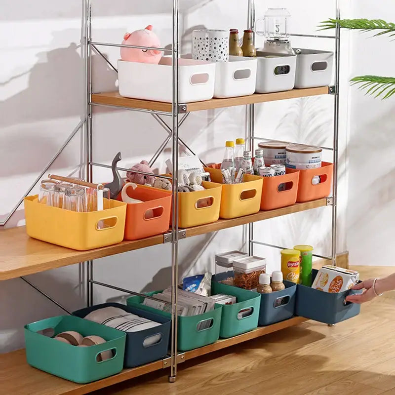 Multicolored plastic kitchenware storage containers with handle cutouts on wooden shelves for decorbites kitchenware storage