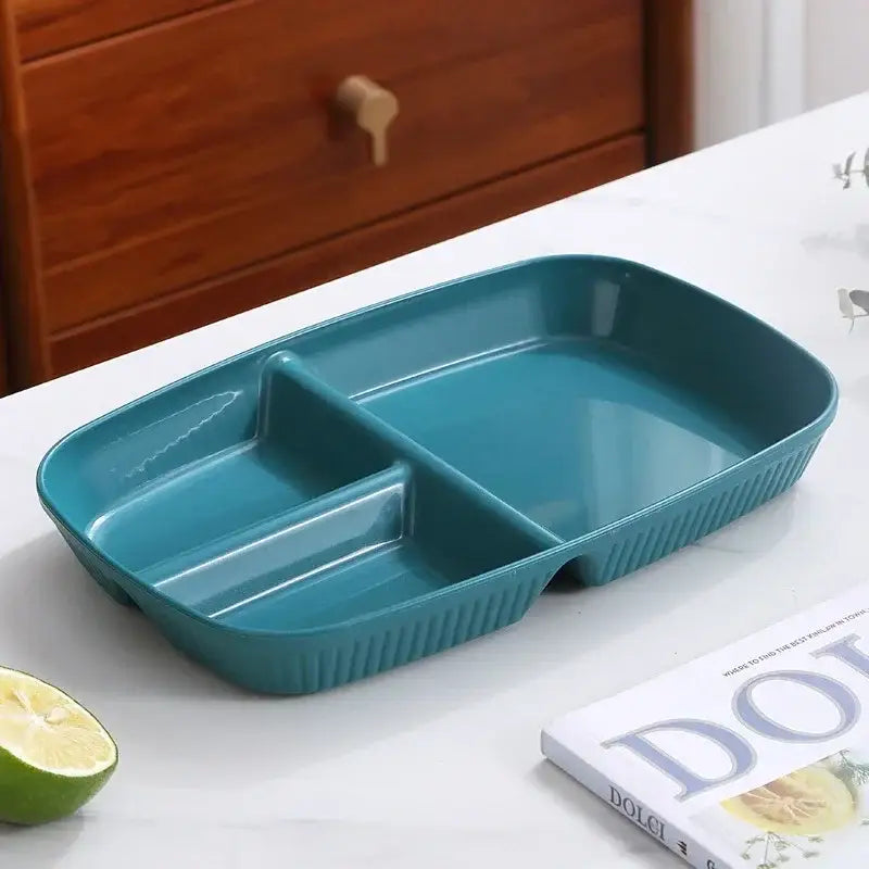 Teal rectangular divided dish diet plate with three compartments and ribbed edges for dining room use