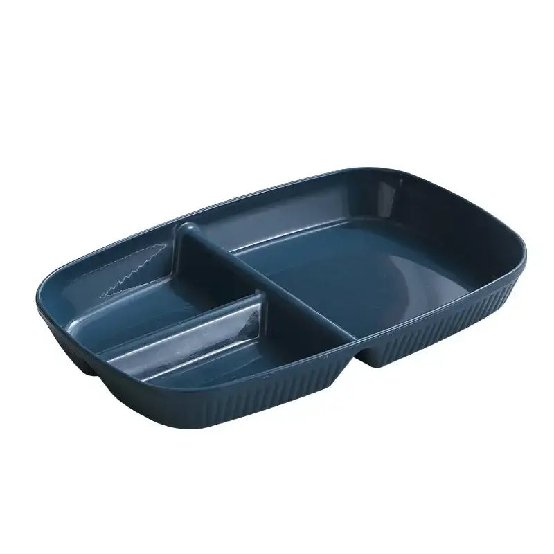 Dark blue plastic divided dish diet plate with three compartments and ribbed edges for dining room use