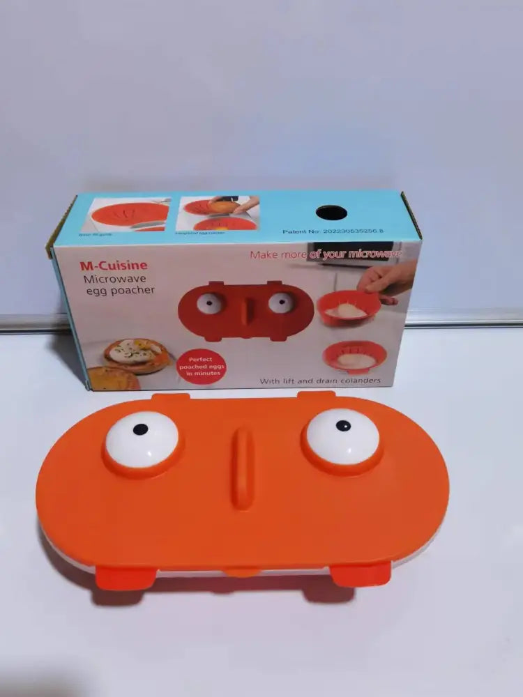 Orange silicone double layer egg boiler silicone with white eye-like knobs and central slot for microwave cooking tools