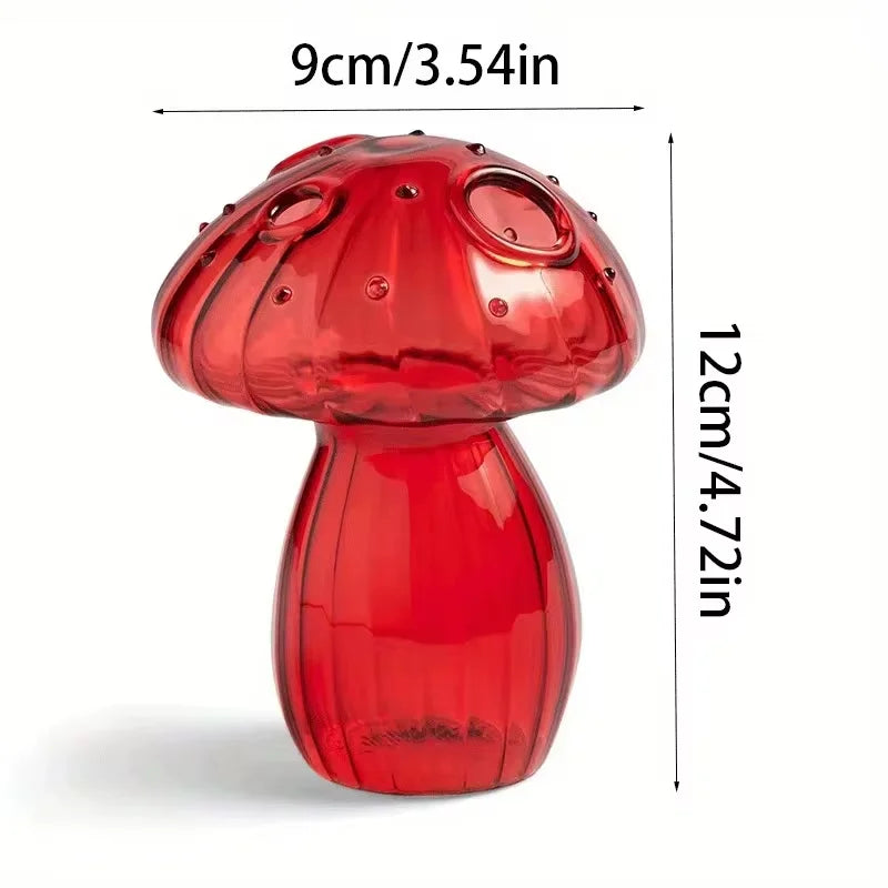 A translucent red glass mushroom vase with glossy finish and ridges for hydroponic aromatherapy decoration