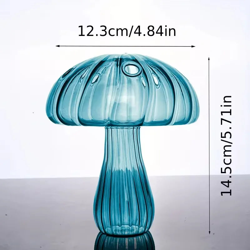 A translucent blue glass mushroom-shaped vase with ribbed texture and glossy finish for home decoration