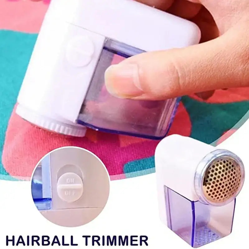 Compact blue and white electric fuzz pellet remover with a white plastic body and metallic mesh head for fabric trimming