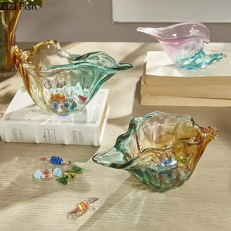 Vibrant hand-blown glass conch candy jar with swirling green and amber hues by decorbites for dining room storage