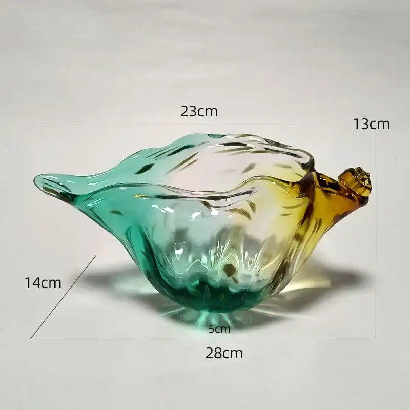 Translucent glass decorbites conch candy jar in shell shape with teal to amber gradient and textured design for dining room storage