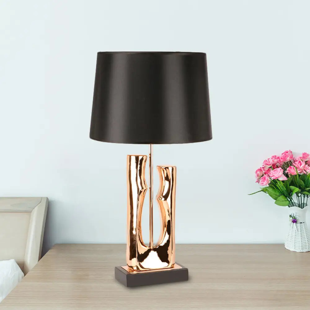 Contemporary 1-Head Black Barrel Fabric Table Light – Creative Desk Lamp for Bedroom