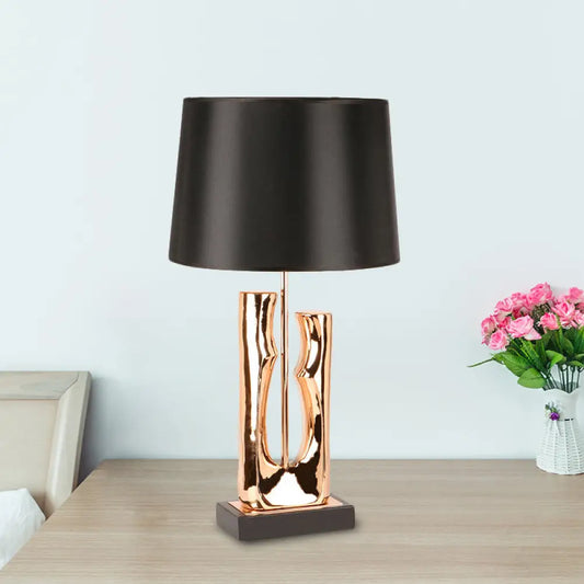 Contemporary 1-Head Black Barrel Fabric Table Light – Creative Desk Lamp for Bedroom