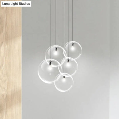 Contemporary 1-Light Black Orb Pendant: 6"/8"/12" Wide, Clear Glass, Ideal for Living Room Ceiling