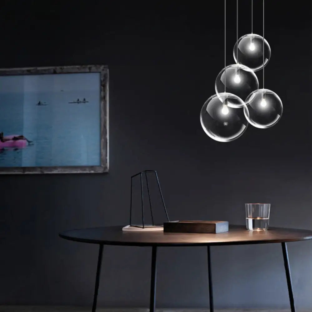 Contemporary 1-Light Black Orb Pendant: 6"/8"/12" Wide, Clear Glass, Ideal for Living Room Ceiling