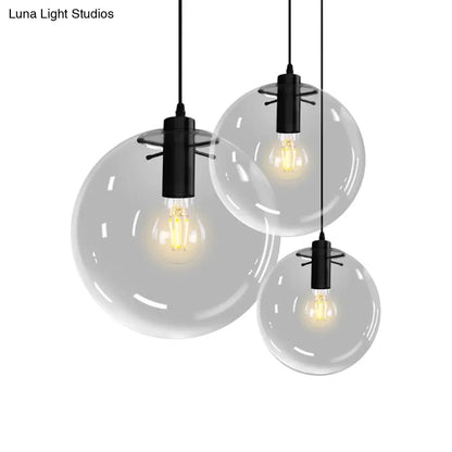 Contemporary 1-Light Black Orb Pendant: 6"/8"/12" Wide, Clear Glass, Ideal for Living Room Ceiling