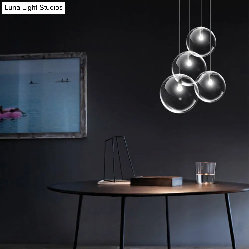 Contemporary 1-Light Black Orb Pendant: 6"/8"/12" Wide, Clear Glass, Ideal for Living Room Ceiling