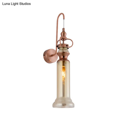 Aplique de pared DecorBites™ contemporáneo de 2 luces con acabado en cobre, tubo de cristal gris humo/ámbar y brazo flexible