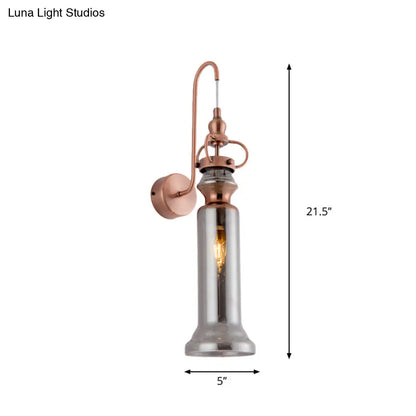 Aplique de pared DecorBites™ contemporáneo de 2 luces con acabado en cobre, tubo de cristal gris humo/ámbar y brazo flexible