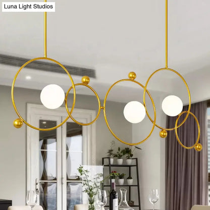 Lámpara colgante de isla DecorBites™ contemporánea de 3 luces con anillo de cristal dorado y varillas ajustables