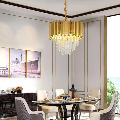 Lámpara de araña colgante contemporánea de tres niveles, circular, de metal, con bloque K9 y acabado en latón.