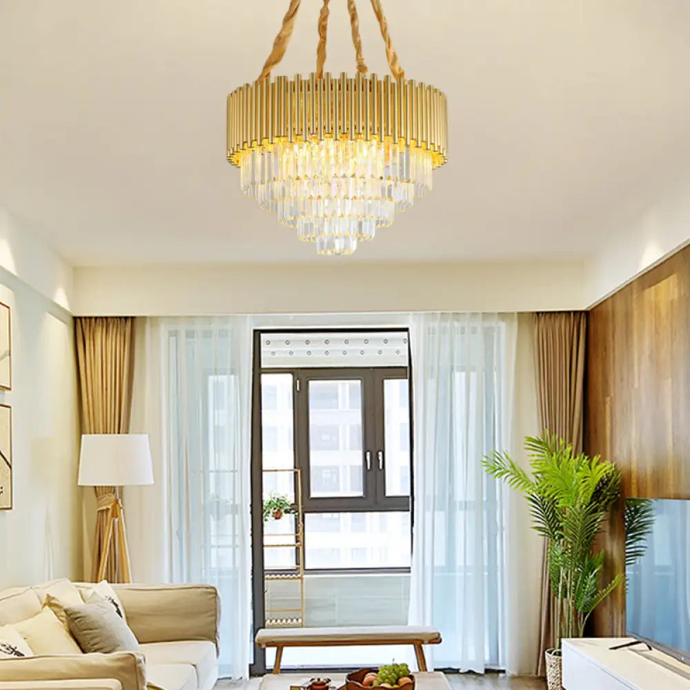 Lámpara de araña colgante contemporánea de tres niveles, circular, de metal, con bloque K9 y acabado en latón.