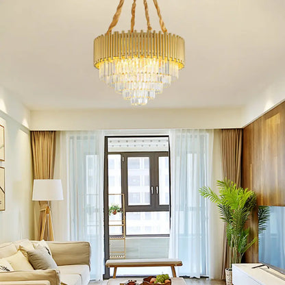 Lámpara de araña colgante contemporánea de tres niveles, circular, de metal, con bloque K9 y acabado en latón.