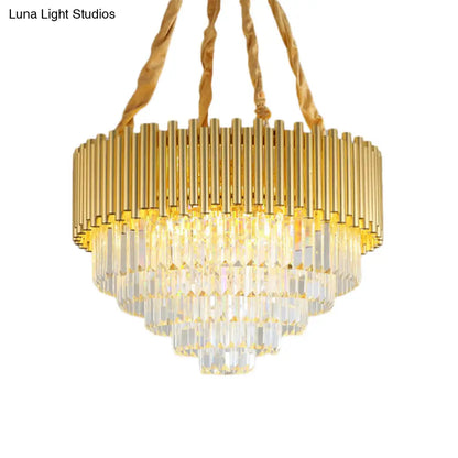 Lámpara de araña colgante contemporánea de tres niveles, circular, de metal, con bloque K9 y acabado en latón.