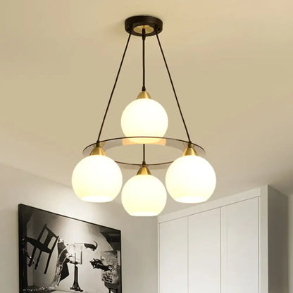 Lámpara de araña contemporánea de 4 luces en negro y dorado con pantalla de cristal opalino