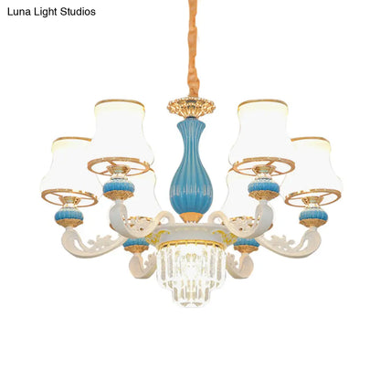 Lámpara de araña contemporánea de 6 luces en azul y blanco con colgante de cristal opalino y cristal.